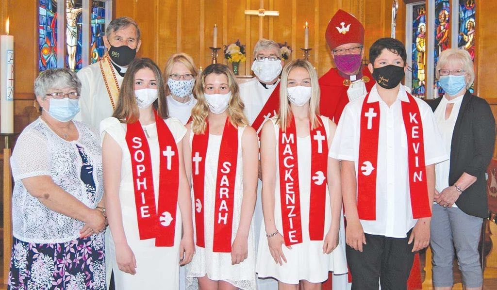 Front row: Sharon Billard (Teacher), Sophie King, Sarah Sweet, Mackenzie Keeping, Kevin Hodder. Back row: Rev’d Nathan Cutler, Deacon Isabel Cutler, Deacon John Billard, Bishop John Organ, Shirley Osmond (Teacher)