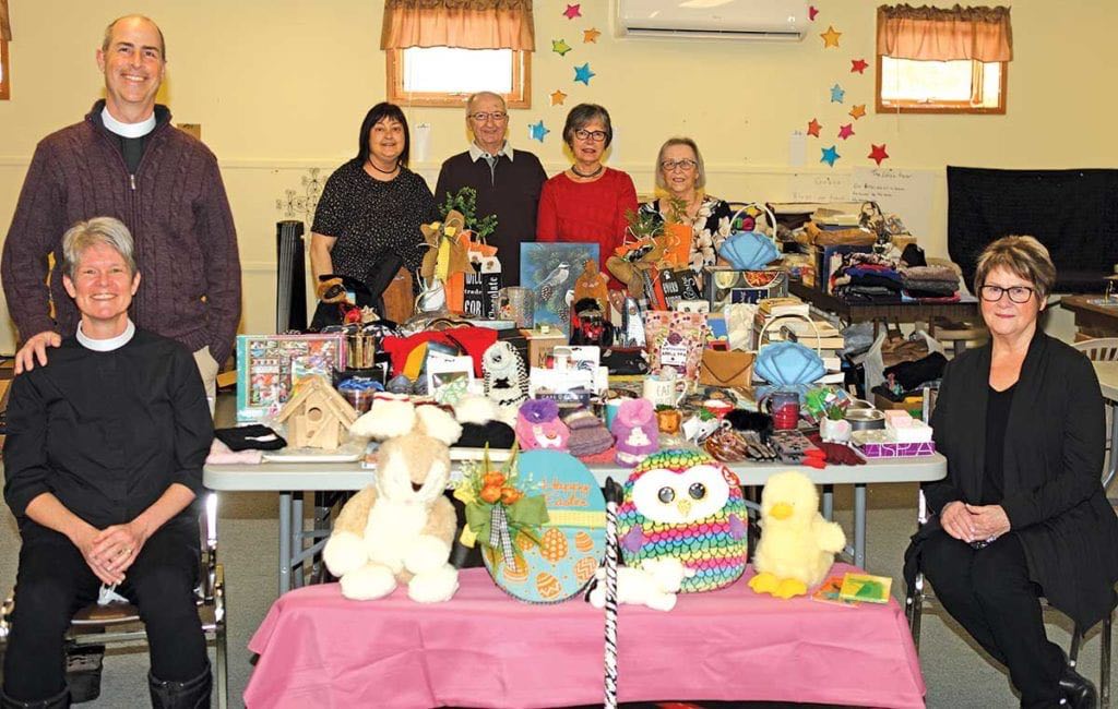 Seated front left are The Rev’d Dr. Amy E. Richter, and standing is her husband The Rev’d Dr. Joseph S. Pagano. Seated on the front at the right is Emmie Penney. Standing in the back are Colleen Harris, Joseph Hillier, and Carol Parsons.