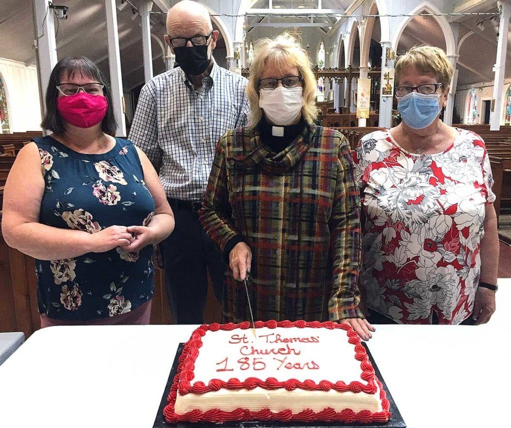 Cutting the cake at the anniversary