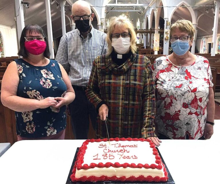 Cutting the cake at the anniversary