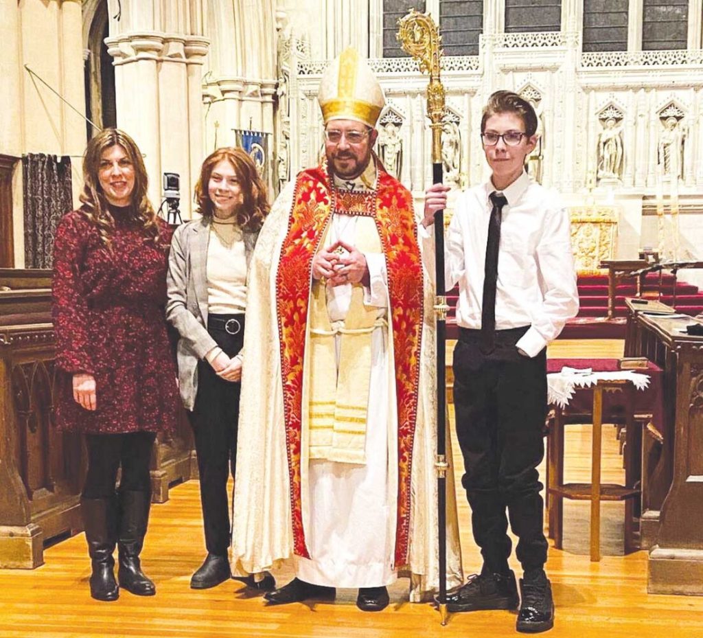 The Rose family. Left to right: wife , Jill; daughter, Amy; Bishop Rose; son, Samuel