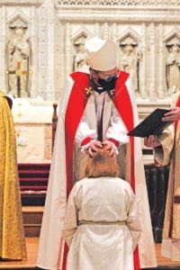 Bishop Sam ordaining Amber
