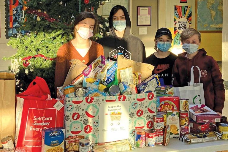The confirmands on ther first sucessful day of their food drive at Pearson Academy School