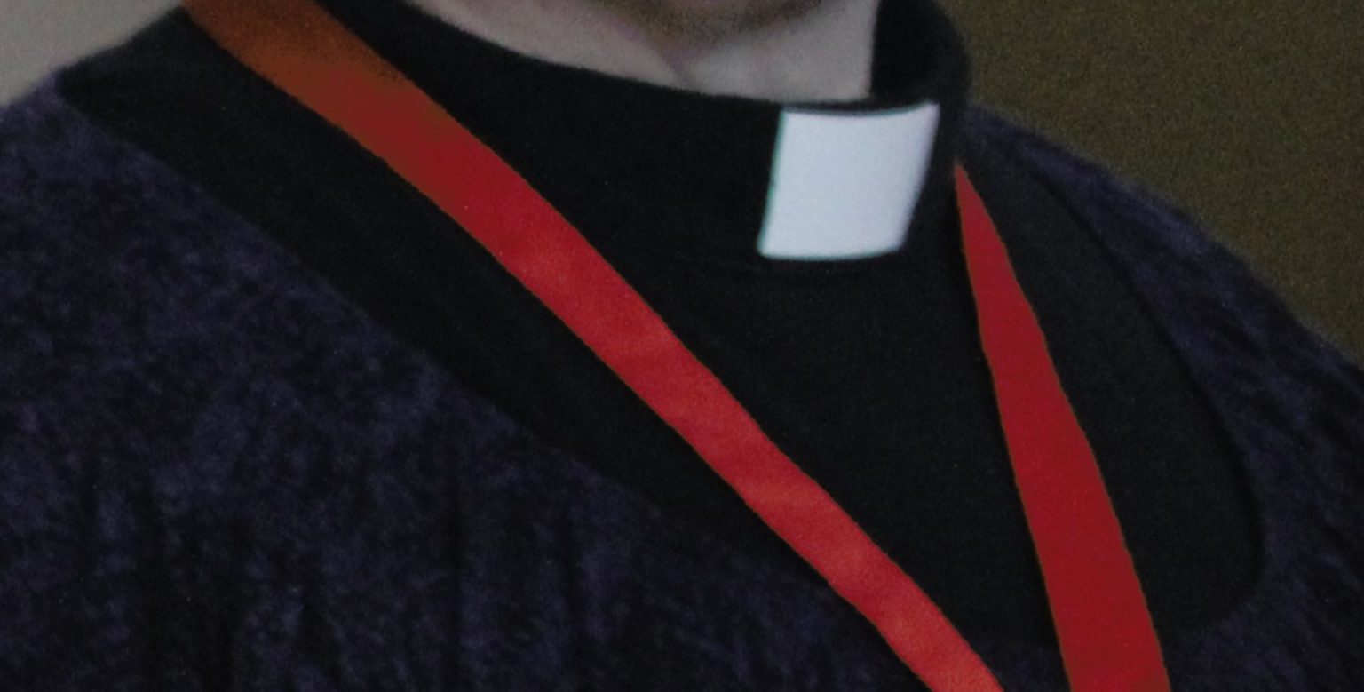 priest in a collar