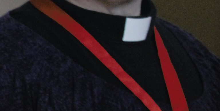 priest in a collar