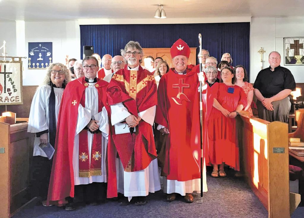 gathered people for ordination of Terrance Coates
