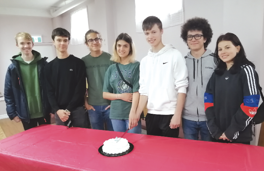 international students with cake