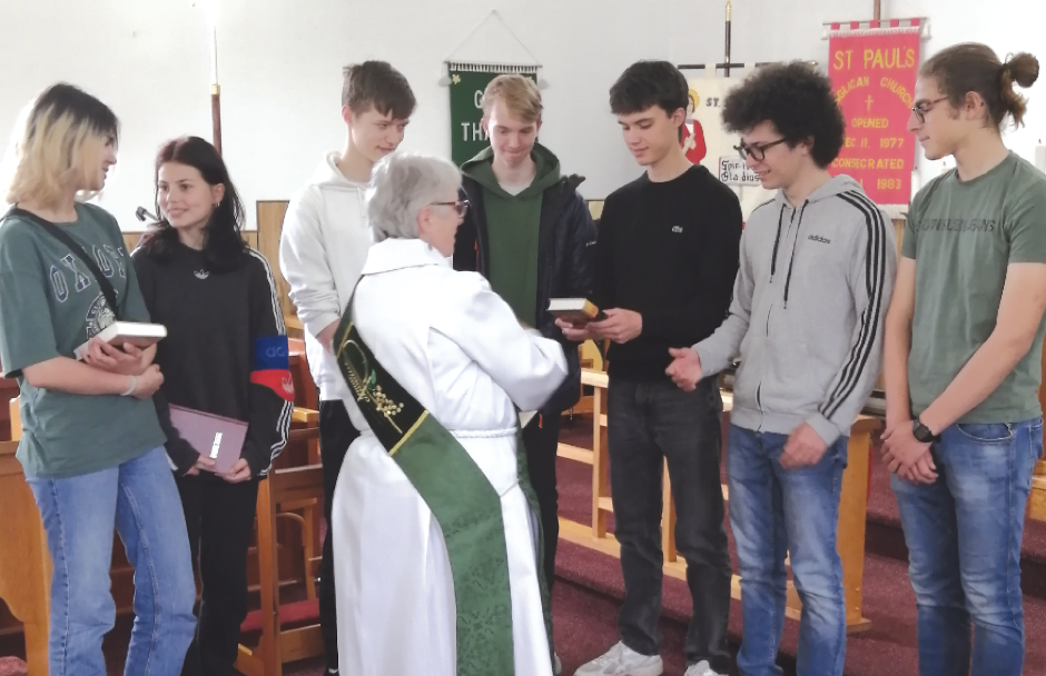 Bibles being presented to international students in Summerside
