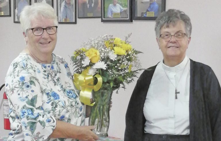 presentation of flowers to an outgoign rector