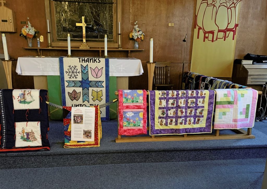 quilts on the altar rail, Rocky Harbour NL