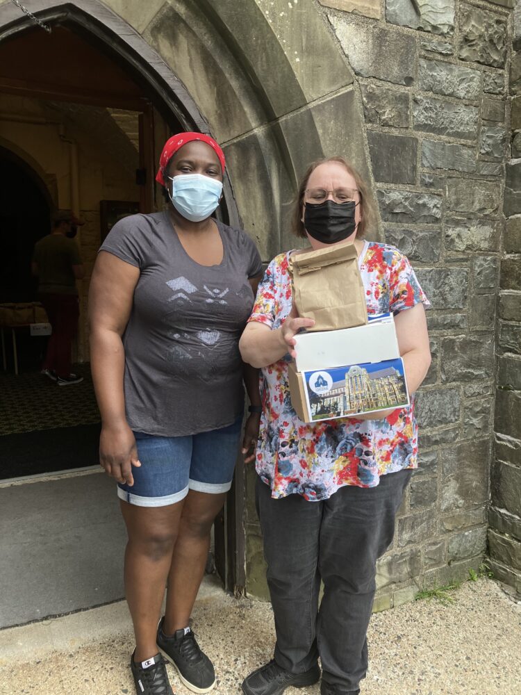 Take-away tea at the cathedral, July 2022. Patrice Gordon (server), and Gina Jamieson Bartlett (patron)