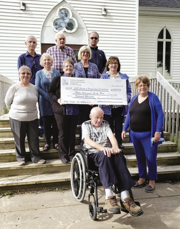 people gathered on the steps of the cathedral for an ALS fundraiser