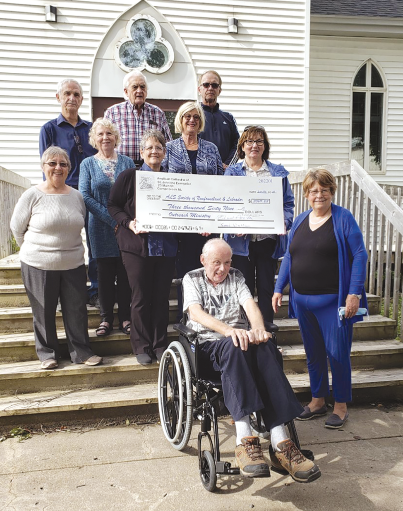 people gathered on the steps of the cathedral for an ALS fundraiser