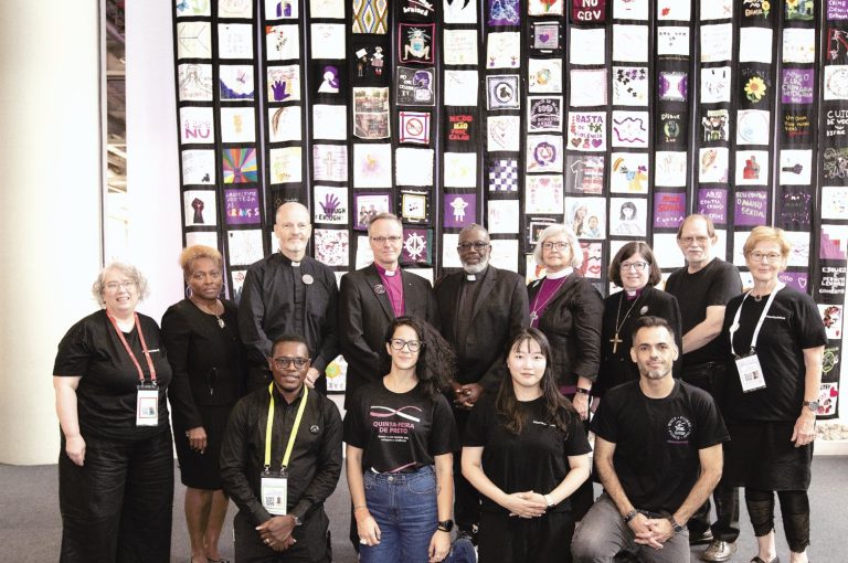people in front of the tapestry for Thursdays in Black
