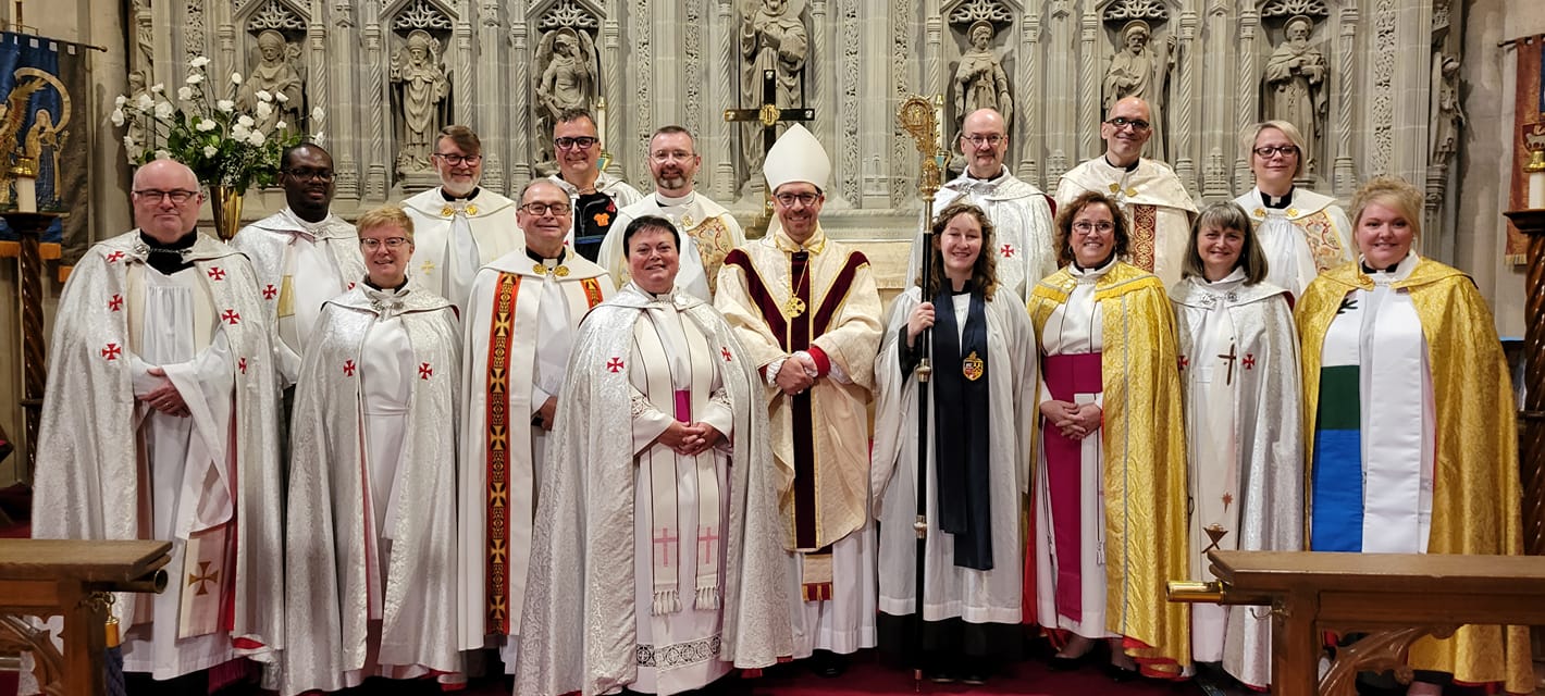group of clergy in sanctuary of the Anglican Cathedral, fall 2022, St. John's
