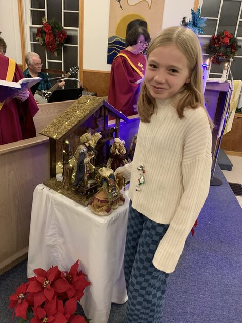 Girl at church at Christmas