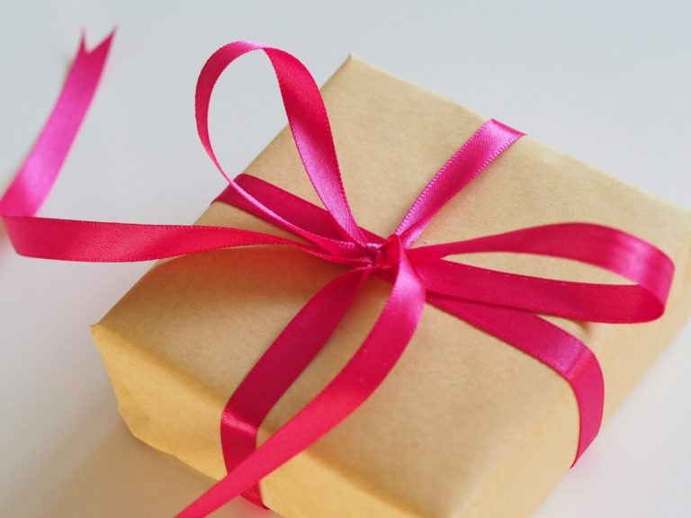 Gift for Christmas by Jess Bailey on unsplash.com
