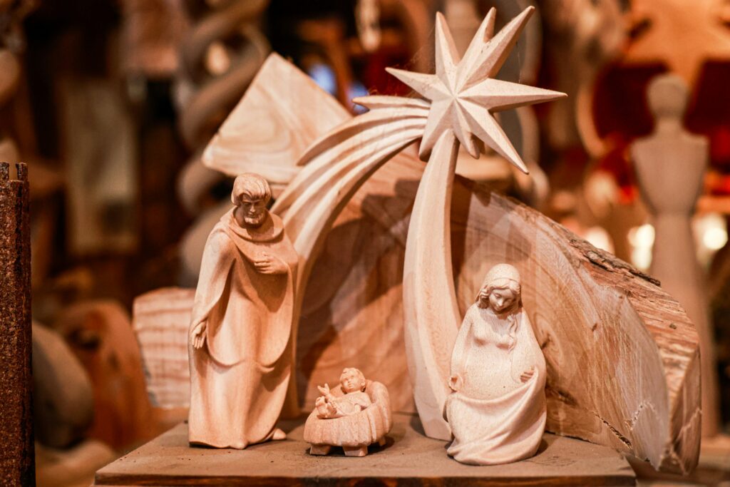 Christmas nativity wood carving; photograph by Mario Ls Pergola on unsplash.com.