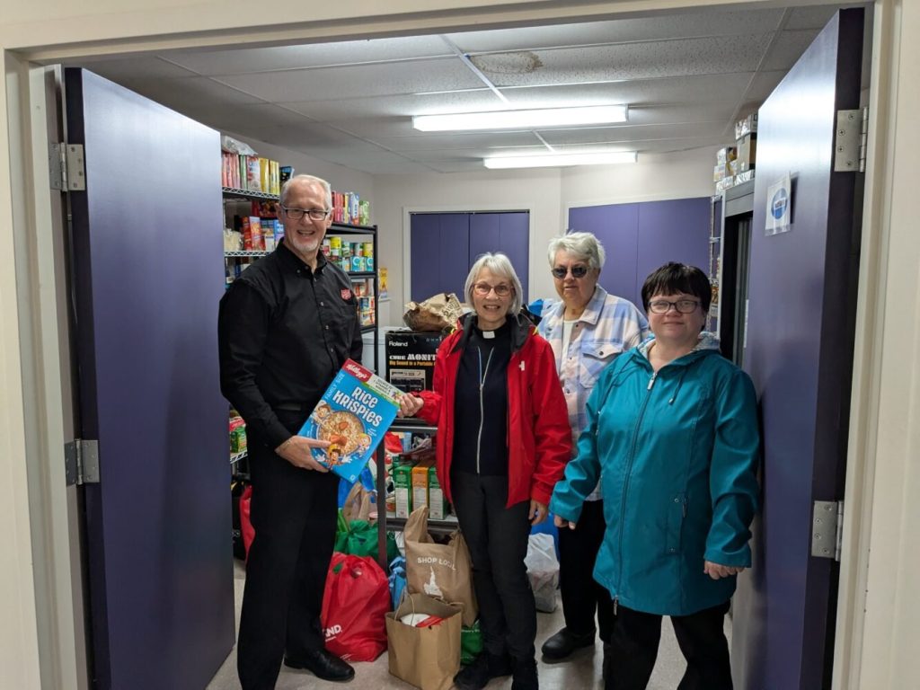 people working together in a food bank