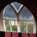 church window with light coming in