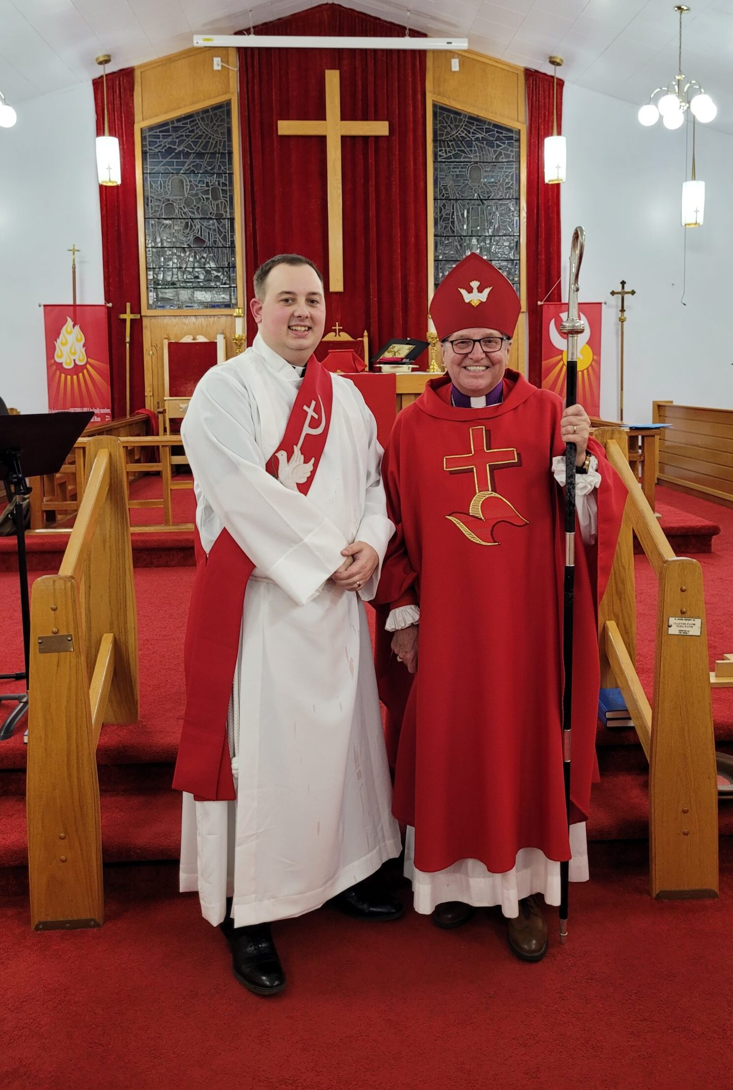 Two men, a deacon and a bishop, in the Anglican Church