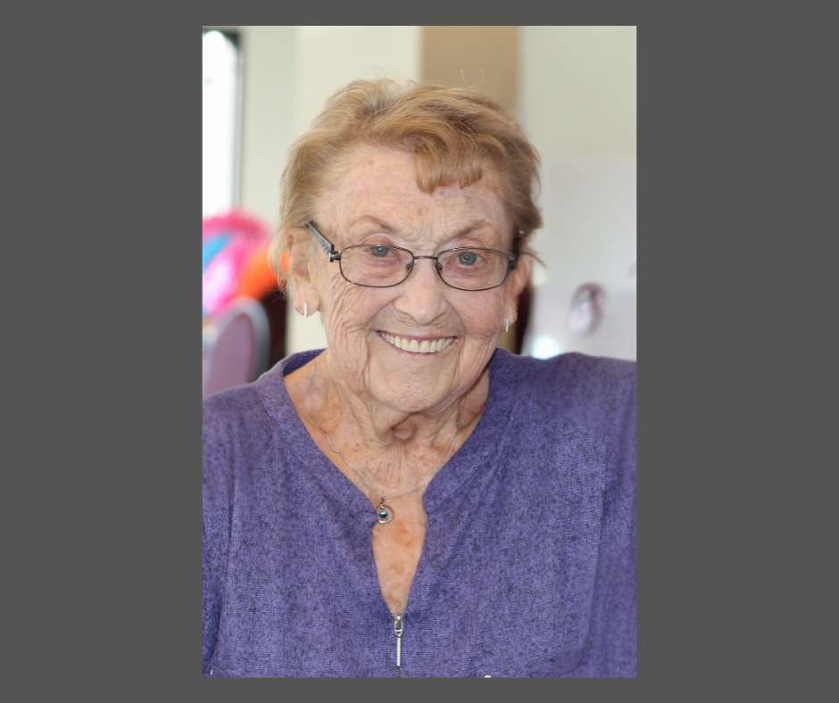 photograph of an oder woman, smiling