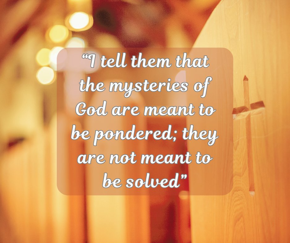 a well lit church with wooden pews with a quotation from the article that this is with