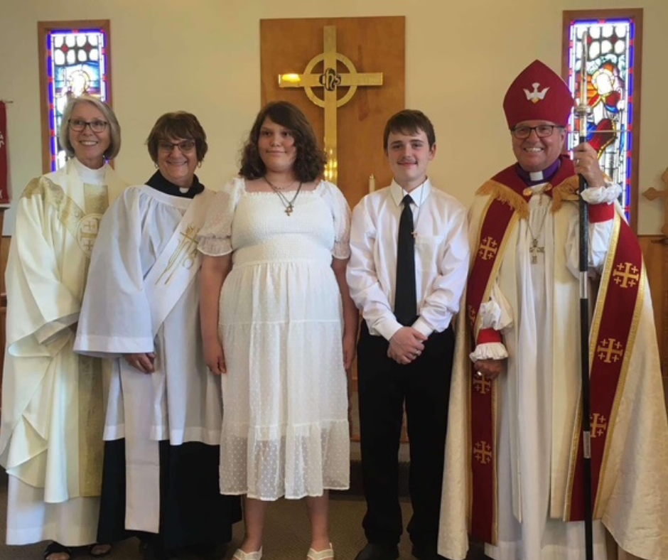 two newly confirmed young people stand with their bishop, their priest, and a deacon