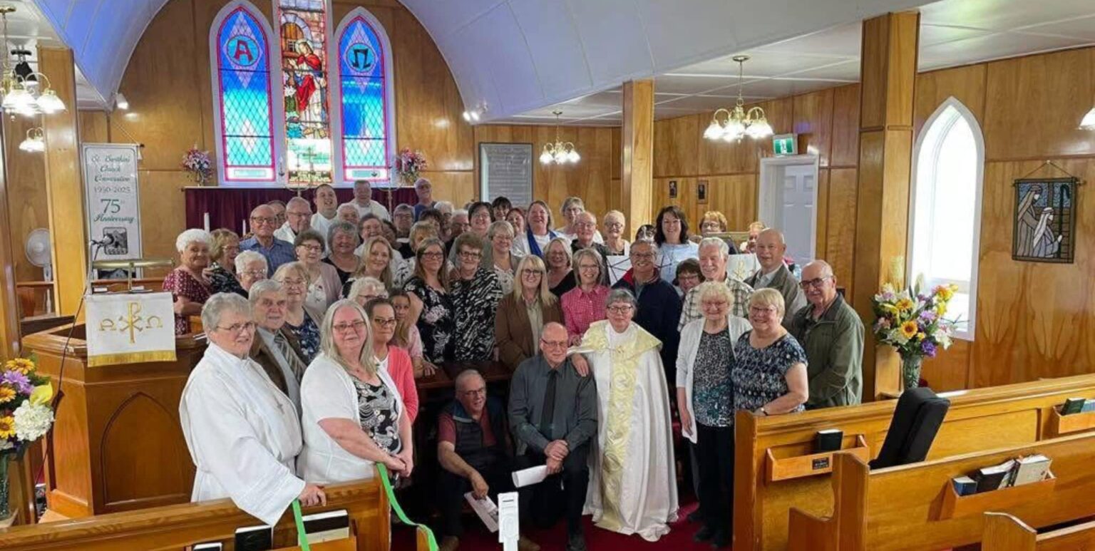 a big group of people at the front of a church