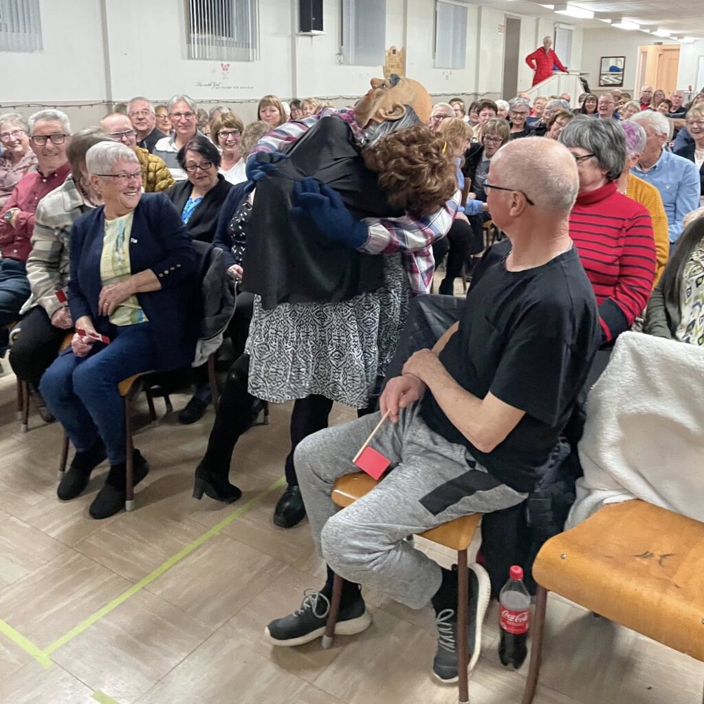a hobby horse in the crowd at an old fashioned concert