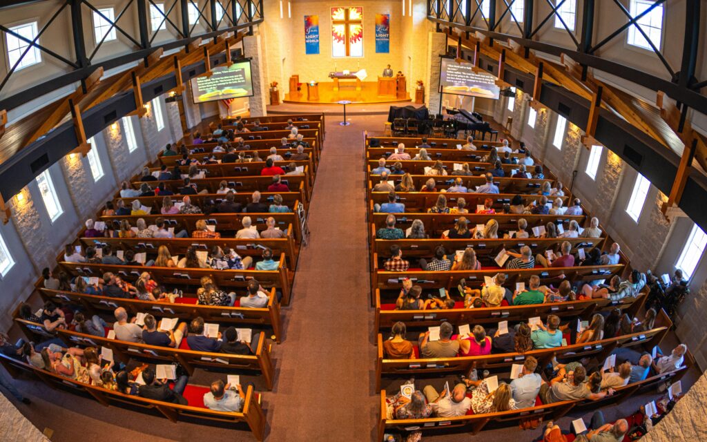High-angle view of a large congregation in a church.