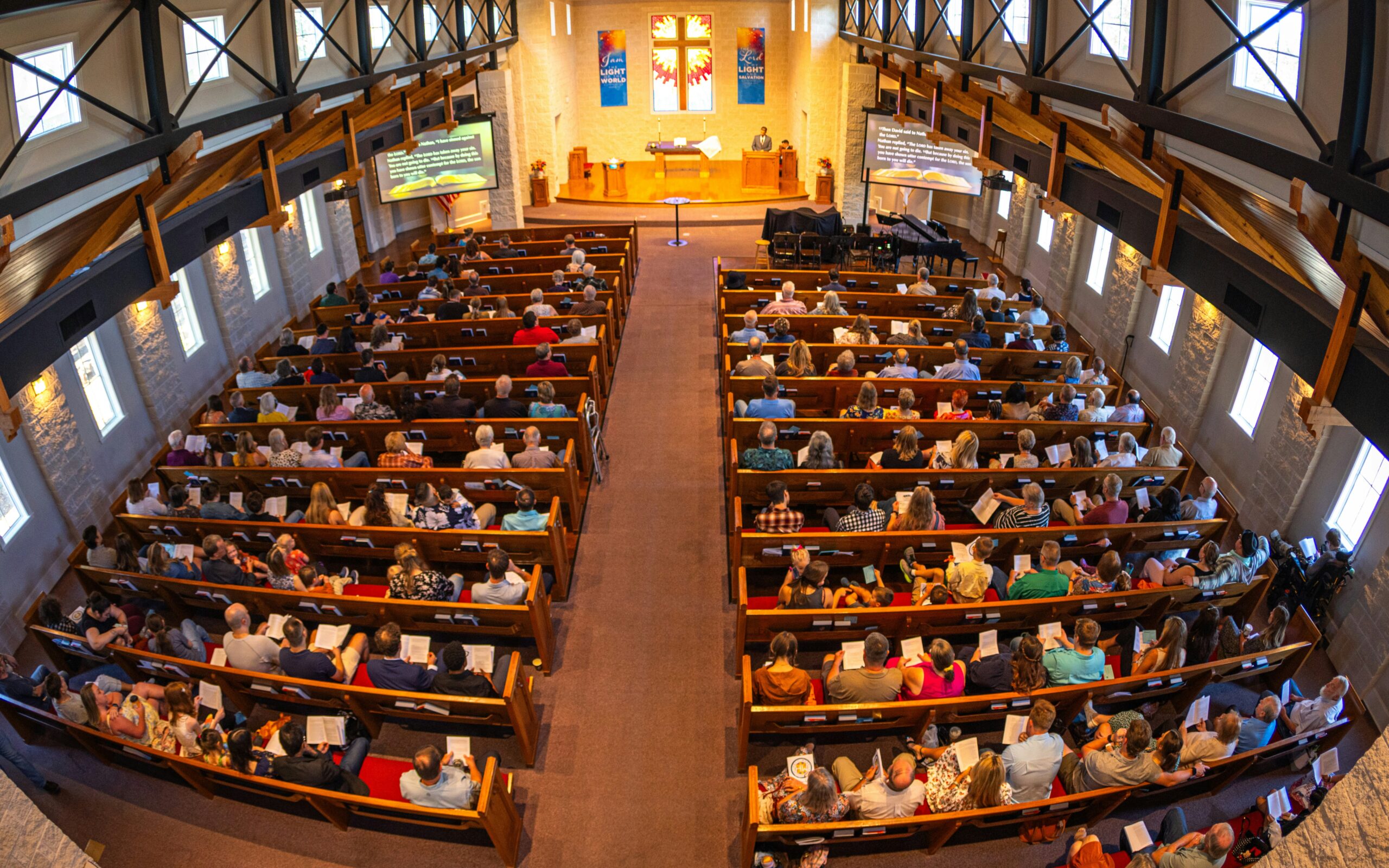 High-angle view of a large congregation in a church.