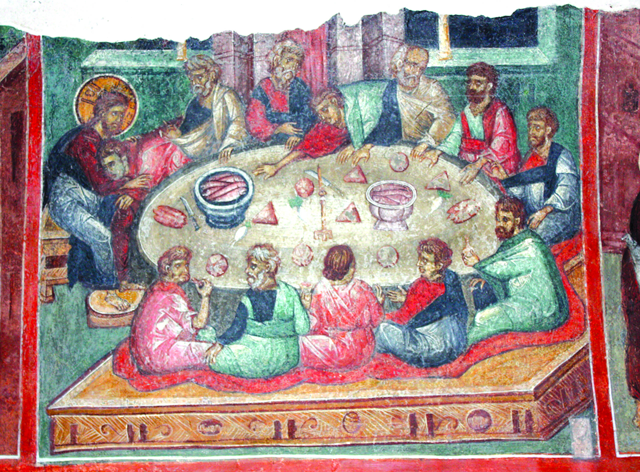 Orthodox fresco depicting the Last Supper with figures seated around an oval table.