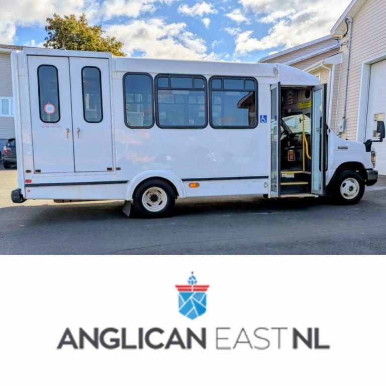 a small white bus which will work as a mobile ministry delivery service