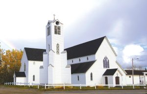 exterior of large old wooden Anglican Church