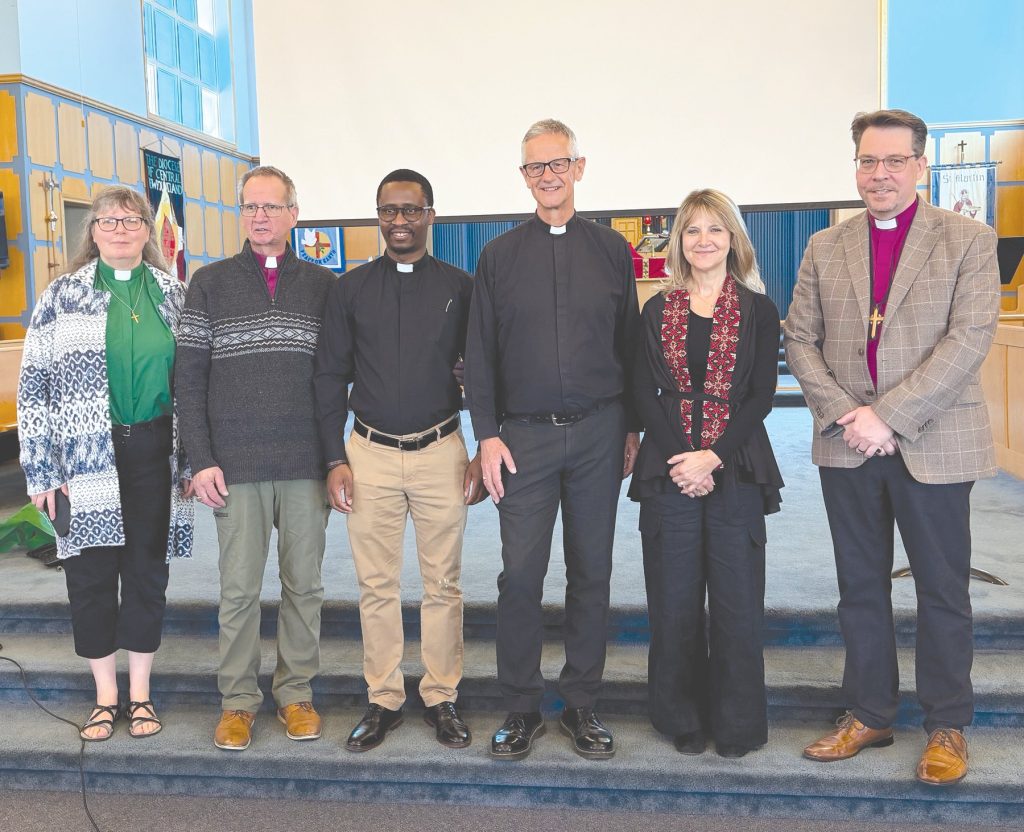 a group of 6 people, 5 clergy, including two bishops