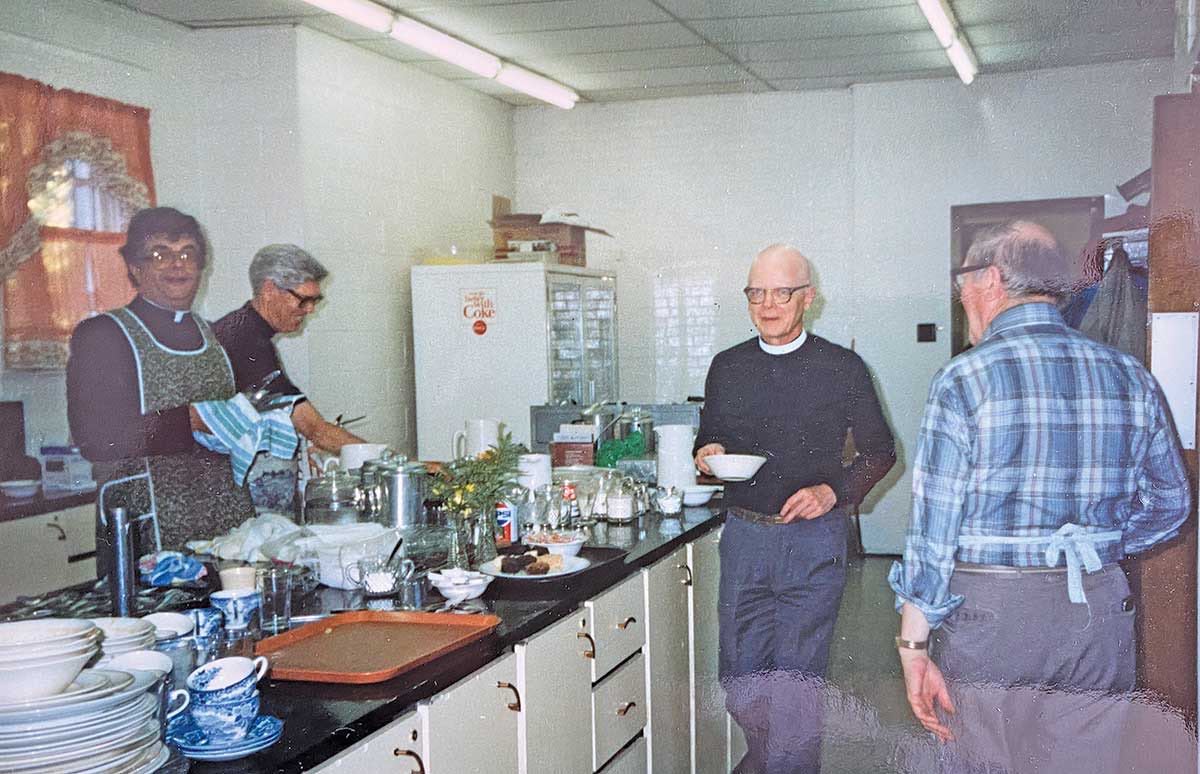 Cleaning up the parish hall kitchen after the Fall Sale, 1989. Pictured are (then Dean) Donald Harvey, the late Rev’d Fifield, the late Rev’d Hinton, and an unidentified man. photograph by Harold Hines