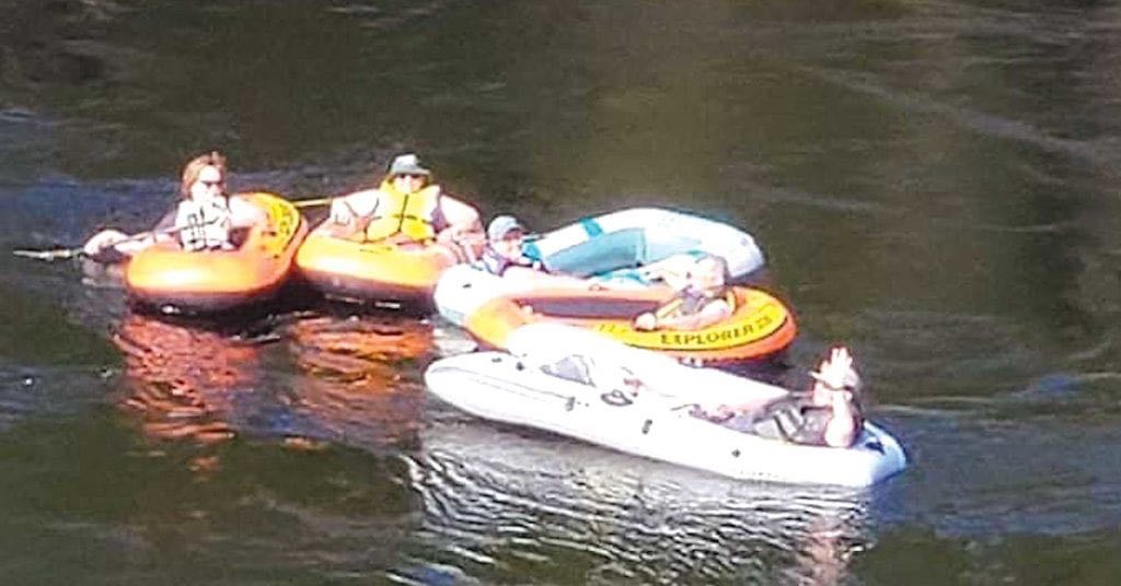 Marie White, Samantha Kenny, Rev’d Tanya, Rev’d Kay, and Cindy Eddison, in calm waters, on their raft adventure on the Humber River