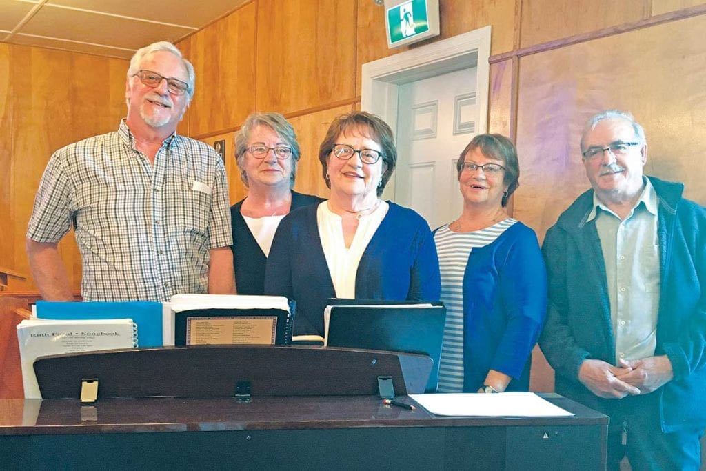Left to right: Peter Robinson, Norma Robinson, Marion Eveleigh, Linda Pinksen, and Eric Robinson, pictured at a special service held for the 71st anniversary of the consecration of St. Swithin’s Church in Seal Cove, White Bay, on June 6th, 2021. The entire family is involved in every aspect of the church.