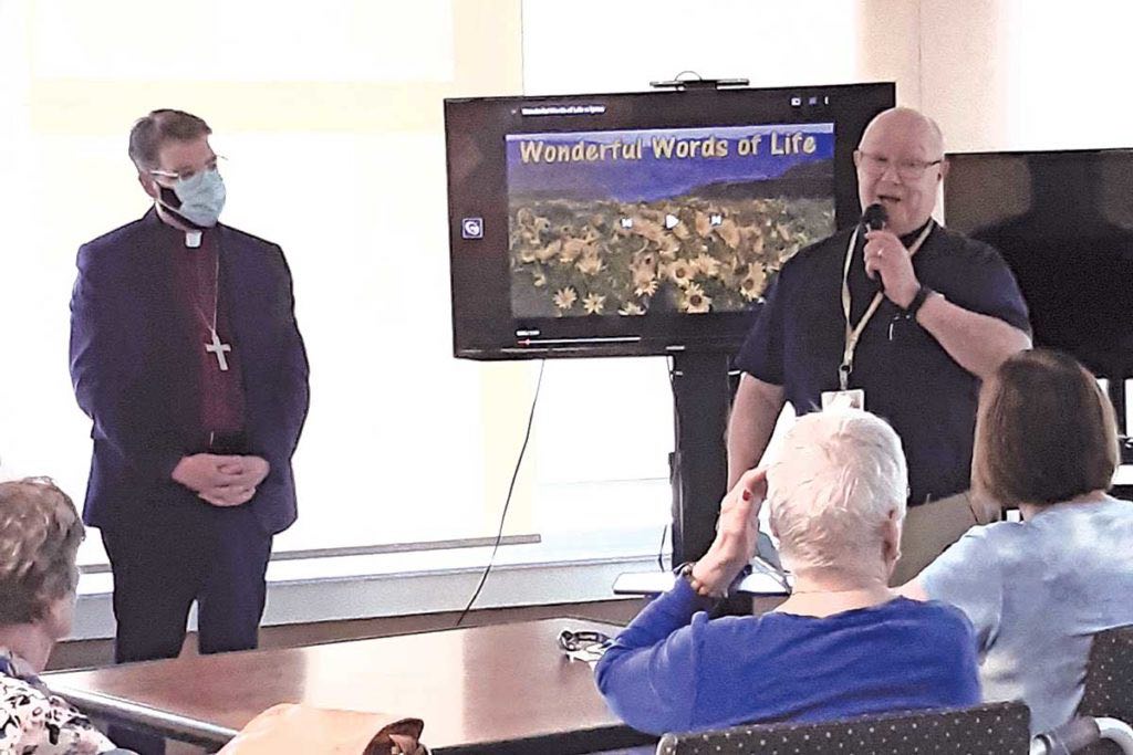 Bishop Sam Rose (left) and the Rev’d David Pilling (right), at the service at Pleasant View Towers in June of 2021.