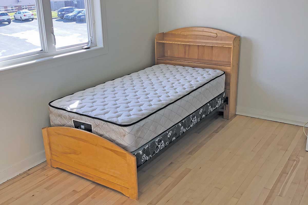 A bed provided by Home Again Furniture bank for a person who needed it.